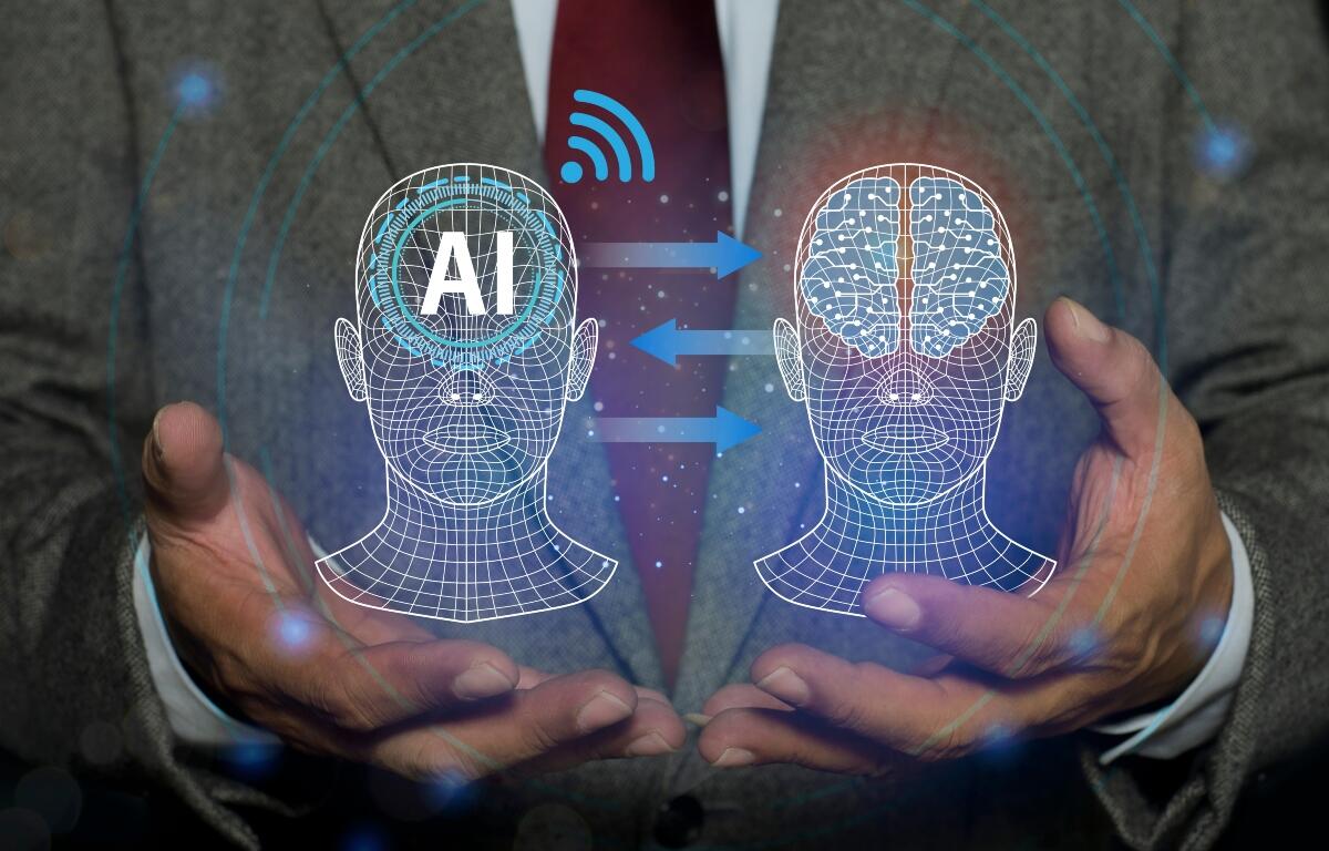 Machine learning with data technology. Robot inputting information from a human head into its own. futuristic digital network technology, innovation. AI Learning and Artificial Intelligence concept