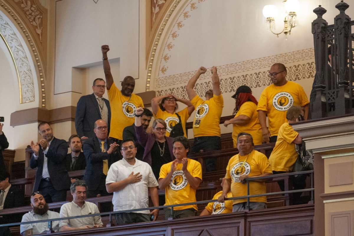 Supporters of the rideshare union bill celebrate in the Senate gallery after the bill passed on the floor. (Capitol News Illinois photo by Jenna Schweikert.)
