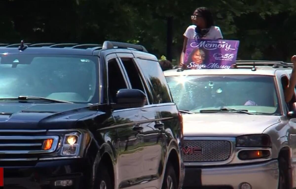 People decorated their cars with messages highlighting the history of Black Lives Matter before taking part in a procession through the city.