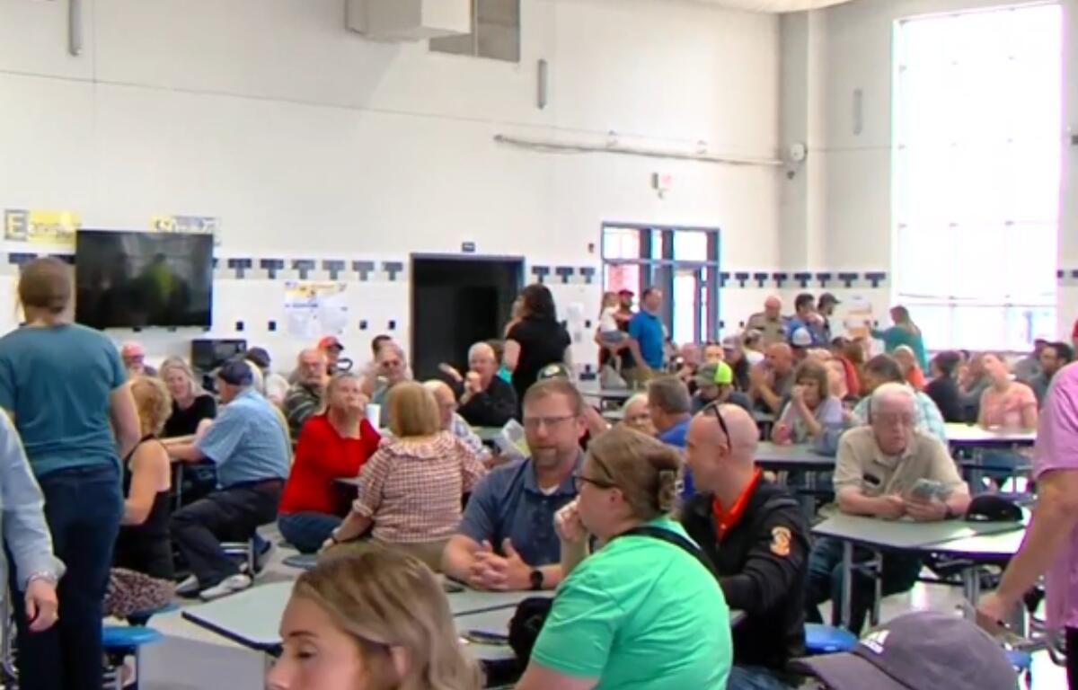 Residents fill Taylorville High School for a meeting on a proposed data center.