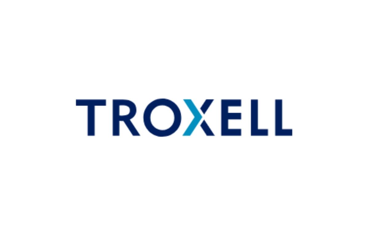 TROXELL logo in bold navy letters with a teal X in the center