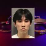 Merlin Lu has been charged with a hate crime after Chicago Police claim he set a cross on fire in the city's Grant Park.