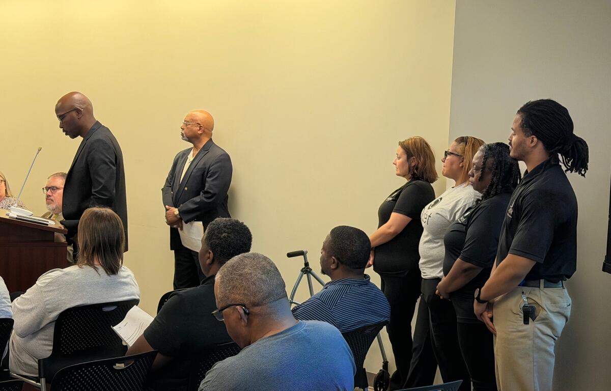 Members of the Springfield NAACP and "The Outlet" speak to the District 186 School Board Monday night.