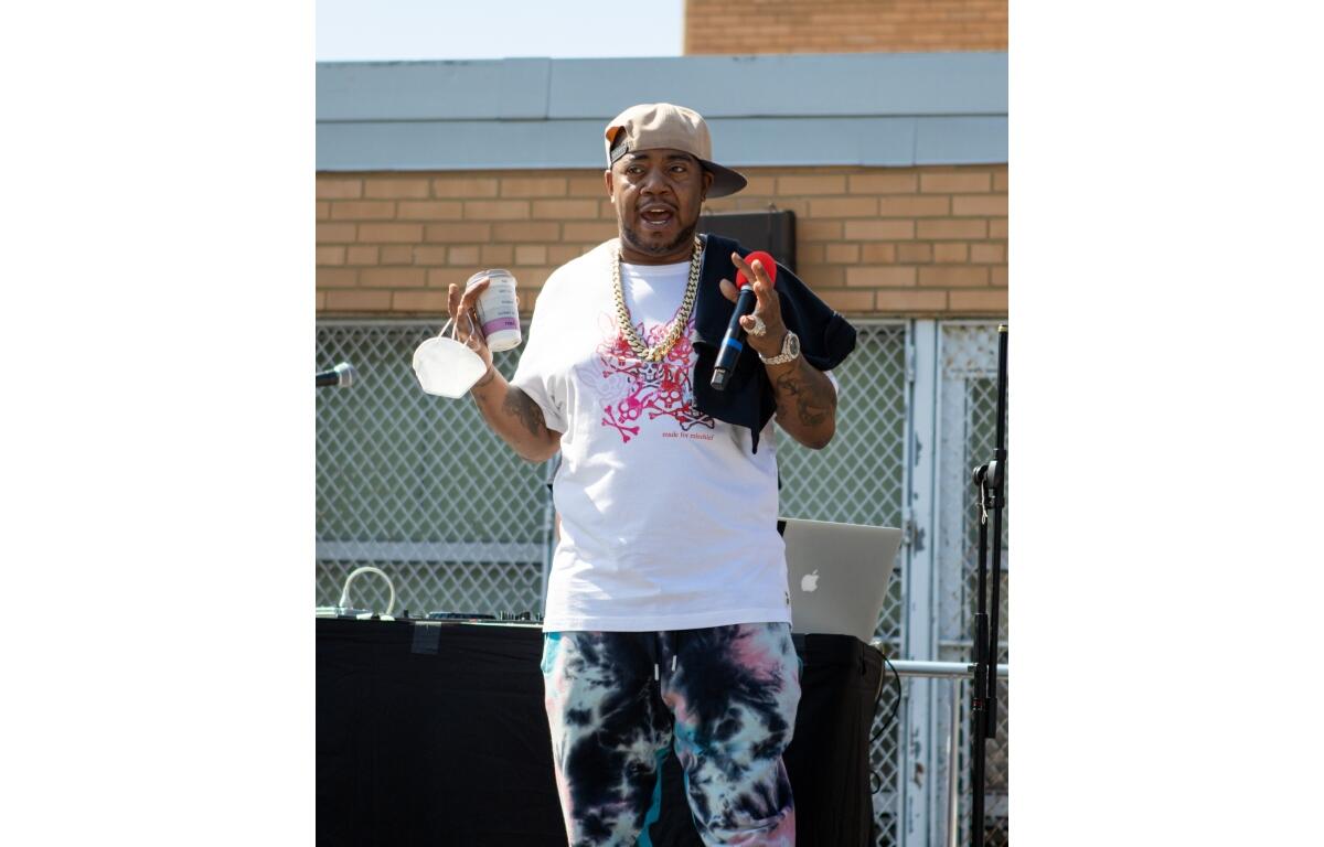 CHICAGO, ILL. USA JULY 11, 2020: DURING THE COVID-19 PANDEMIC CHICAGO NATIVE RAPPER "TWISTA" SPEAKS AT A FOOD GIVEAWAY ON THE FAR SOUTH SIDE OF THE CITY IN THE ENGLEWOOD AREA.