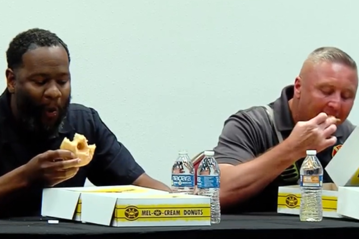 Springfield first responders participate in a donut-eating contest hosted by the Salvation Army for National Donut Day.