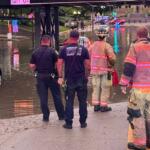 Springfield Firefighters rescue a submerged vehicle Monday, June 8, near Third and Capitol Streets.