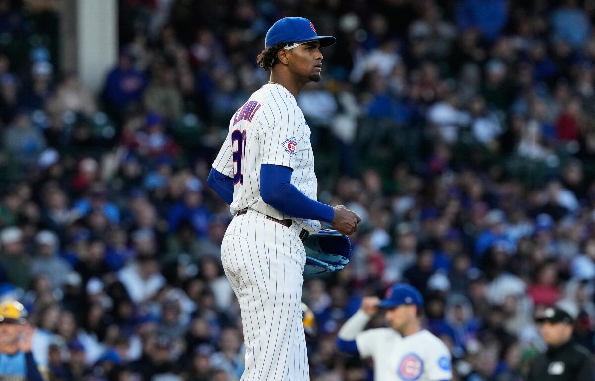 Chicago Cubs starting pitcher Edward Cabrera looks to the scoreboard during the third inning of a baseball game against the Milwaukee Brewers in Chicago, Wednesday, May 20, 2026. (AP Photo/Nam Y. Huh)