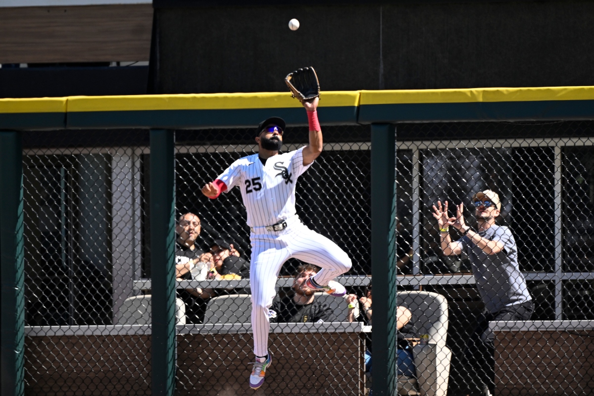 Chicago White Sox right fielder Derek Hill (25) catches a fly ball hit by Minnesota Twins' Tristan Gray during the seventh inning of a baseball game, Thursday, May 28, 2026, in Chicago. (AP Photo/Matt Marton)