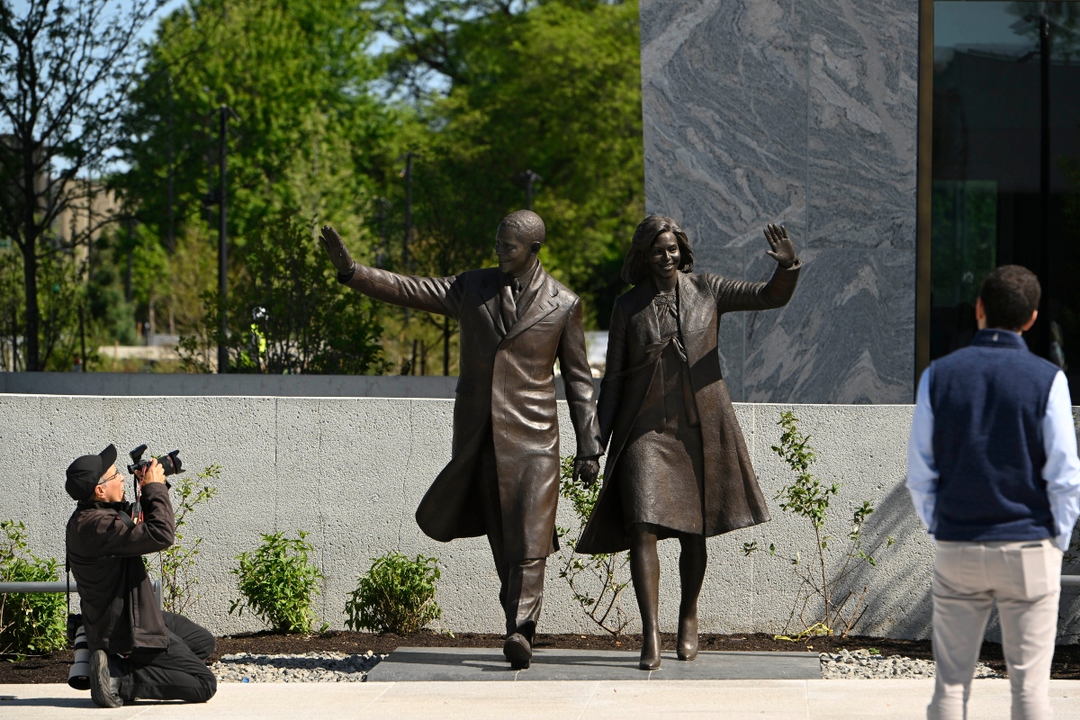Statues of former President Barack Obama and former First Lady Michelle Obama at the Obama Presidential Center in Chicago, Thursday, May 28, 2026. (AP Photo/Paul Beaty)