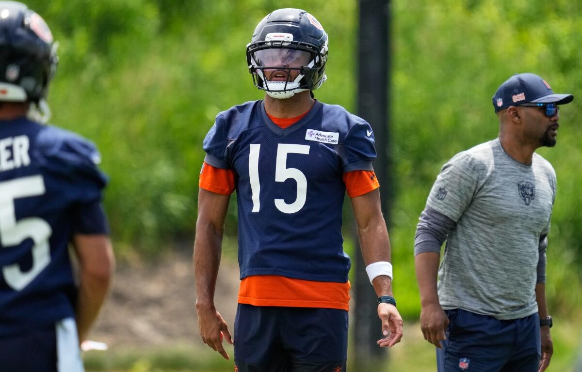 Chicago Bears wide receiver Rome Odunze (15) works on the field during the NFL football team's practice Wednesday, June 3, 2026, in Lake Forest, Ill. (AP Photo/Nam Y. Huh)