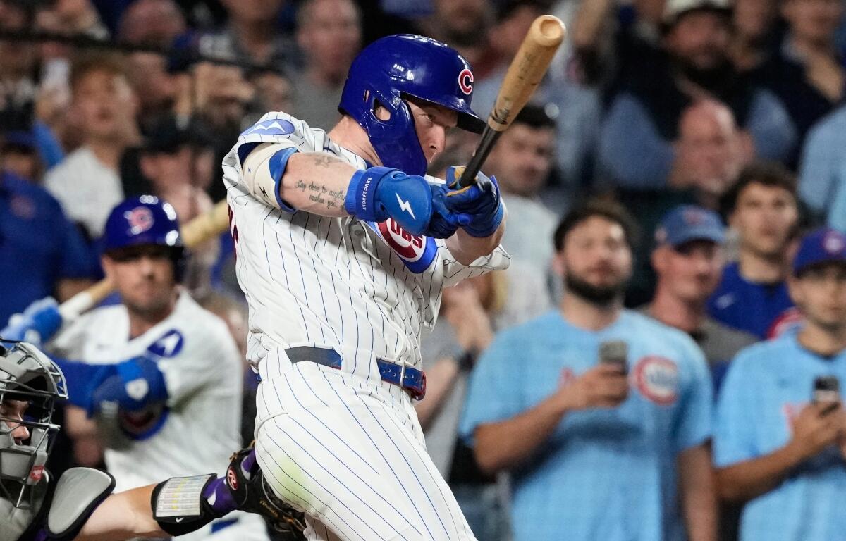Chicago Cubs' Pete Crow-Armstrong hits a single to complete the cycle during the seventh inning of a baseball game against the Colorado Rockies in Chicago, Monday, June 15, 2026. (AP Photo/Nam Y. Huh)