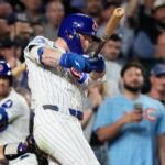 Chicago Cubs' Pete Crow-Armstrong hits a single to complete the cycle during the seventh inning of a baseball game against the Colorado Rockies in Chicago, Monday, June 15, 2026. (AP Photo/Nam Y. Huh)