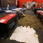Damage from a collapsed roof is seen at Big Red Appliances & Mattresses in Florence, Ky, Thursday, June 18, 2026, after severe weather moved through the region. (AP Photo/Carolyn Kaster)