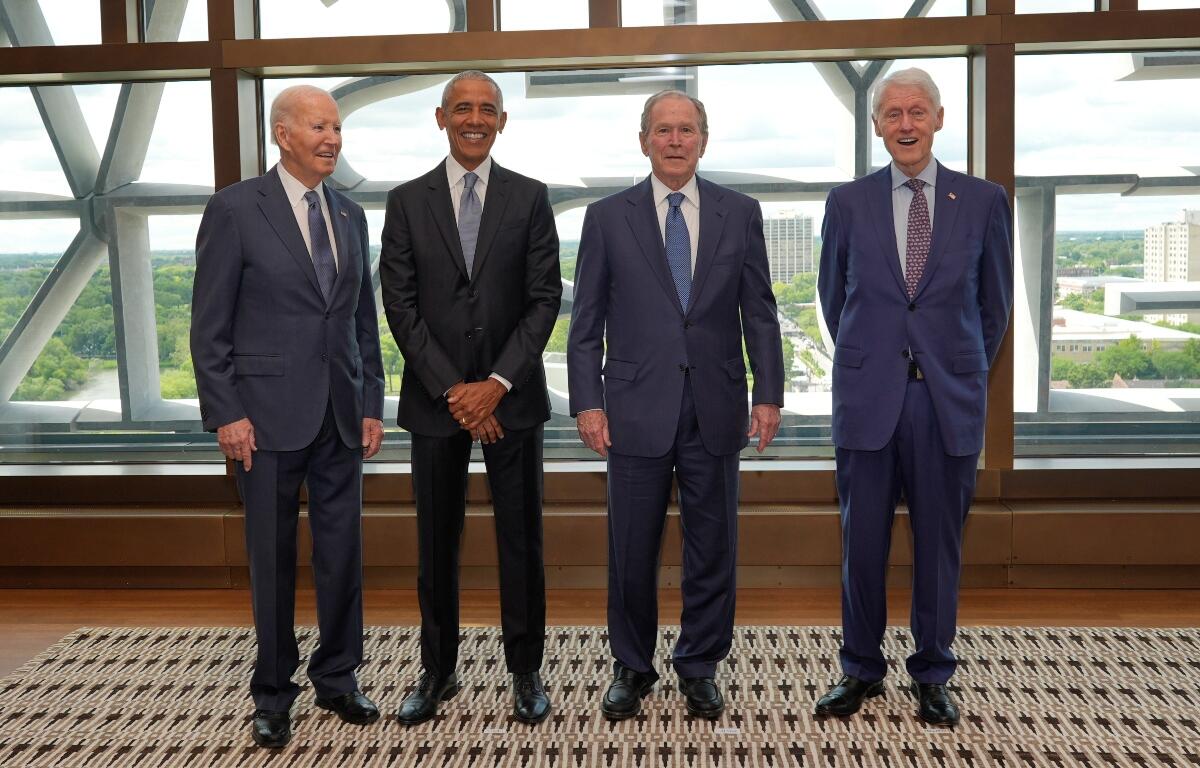 Former President Joe Biden, from left, former President Barack Obama, former President George W. Bush, and former President Bill Clinton, pose for a photo ahead of the dedication ceremony at the Obama Presidential Center, Thursday, June 17, 2026, in Chicago. (AP Photo/Pablo Martinez Monsivais, Pool)