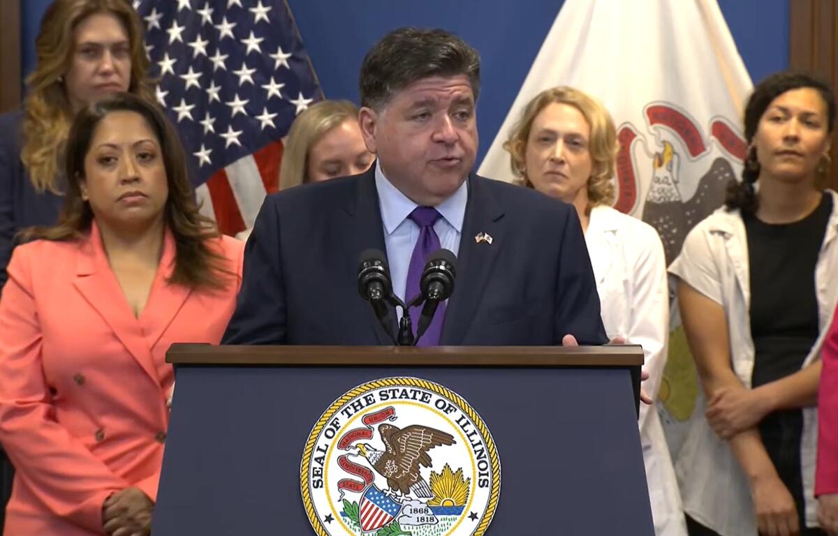 Gov. JB Pritzker speaking at the Wednesday bill signing for a new law that will protect abortion patients’ medical records from out-of-state retaliation.
