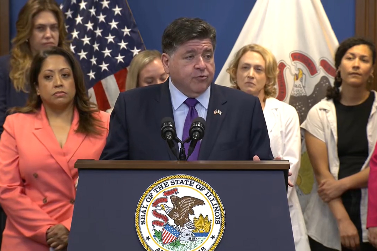 Gov. JB Pritzker speaking at the Wednesday bill signing for a new law that will protect abortion patients’ medical records from out-of-state retaliation.