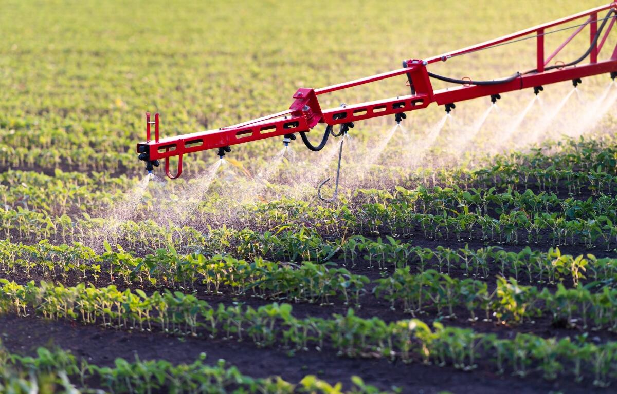 Nozzle of the tractor sprinklers sprayed. Soybean spraying.