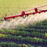 Nozzle of the tractor sprinklers sprayed. Soybean spraying.