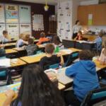 A teacher leads elementary students during class at Community Consolidated School District 204, in Pinckneyville. (Capitol News Illinois photo by Peter Hancock)