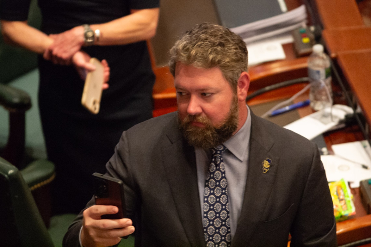 Rep. Harry Benton takes a picture during a joint session of the Illinois House in May 2026. (Capitol News Illinois photo by Jerry Nowicki)