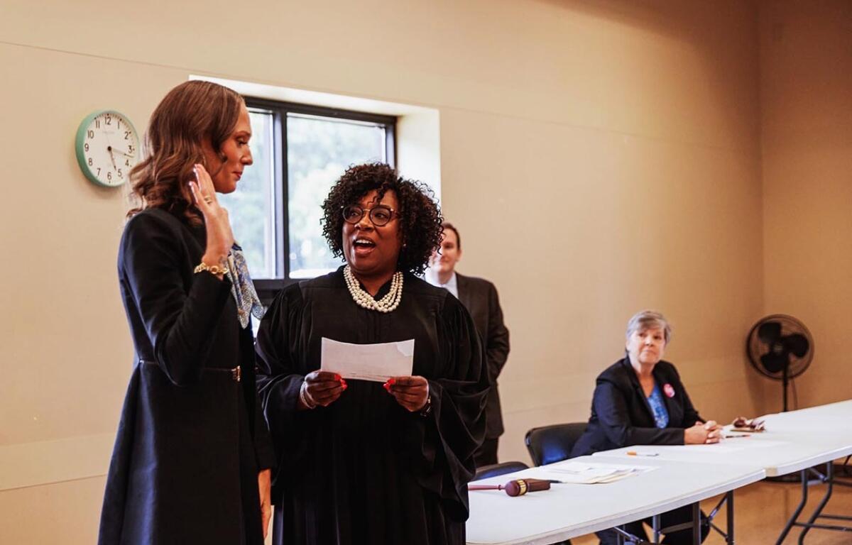 State Rep. Jessica Dixon Heitman, D-Plainfield, is sworn in after being appointed to complete the term of ex-Rep. Harry Benton and replace him on the November ballot. (Photo courtesy of the Will County Democratic Party)
