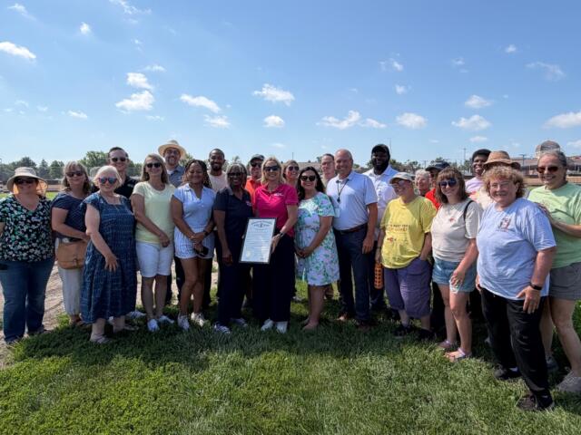 Local and state leaders gathered Wednesday, July 1, with users of the Community Garden at the Illinois State Fairgrounds.