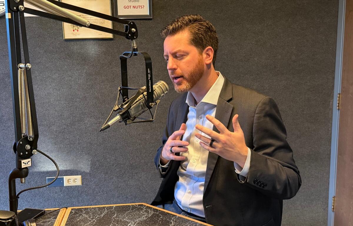 Collin Corbett, candidate for Illinois Governor, speaks at the WTAX Studios.