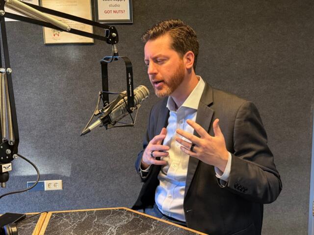 Collin Corbett, candidate for Illinois Governor, speaks at the WTAX Studios.