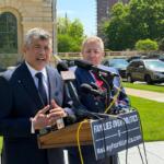 Aaron Del Mar, left, Republican candidate for Lieutenant Governor, speaks alongside Governor candidate Darren Bailey, at an April, 2026 news conference outside the Illinois State Capitol.