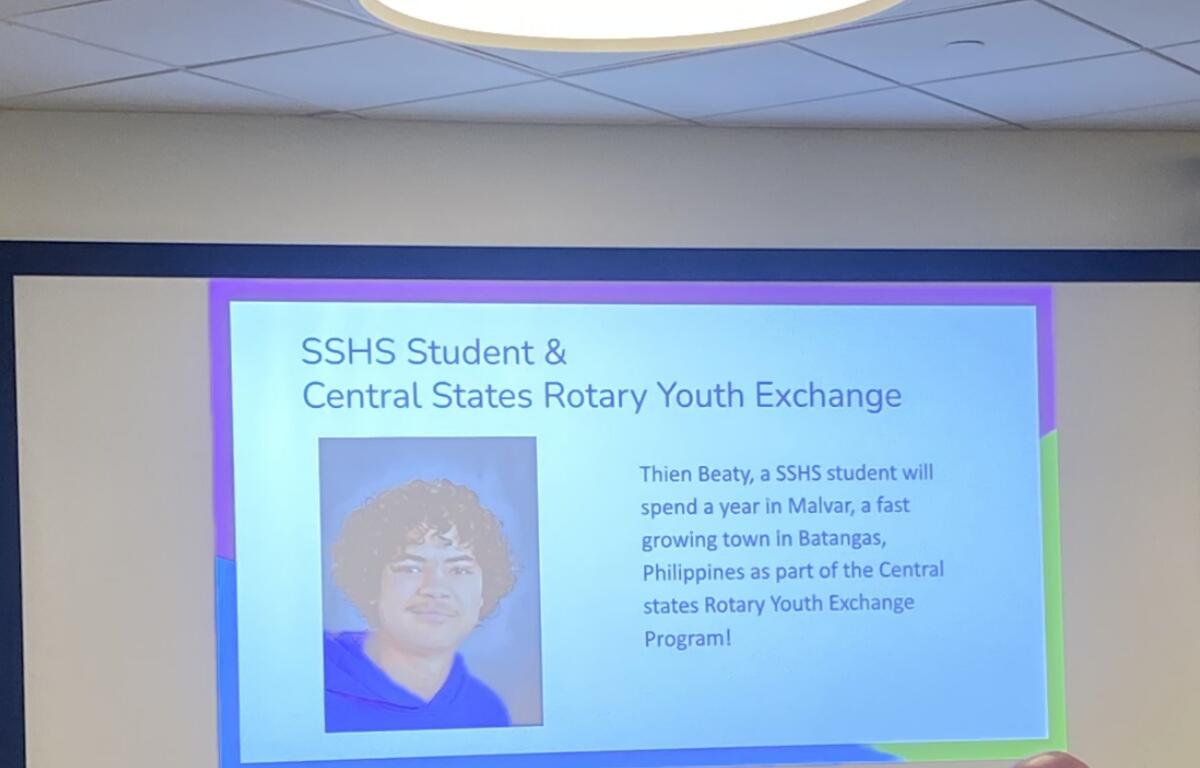 Slide announcing SSHS student & Central States Rotary Youth Exchange with a portrait photo on the left.