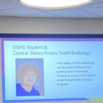 Slide announcing SSHS student & Central States Rotary Youth Exchange with a portrait photo on the left.