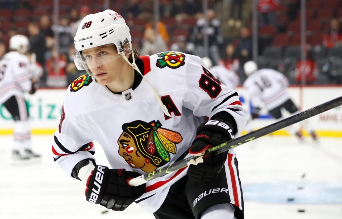 FILE - Chicago Blackhawks right wing Patrick Kane (88) skates before an NHL hockey game against the New Jersey Devils, Tuesday, Dec. 6, 2022, in Newark, N.J. (AP Photo/Noah K. Murray, File)