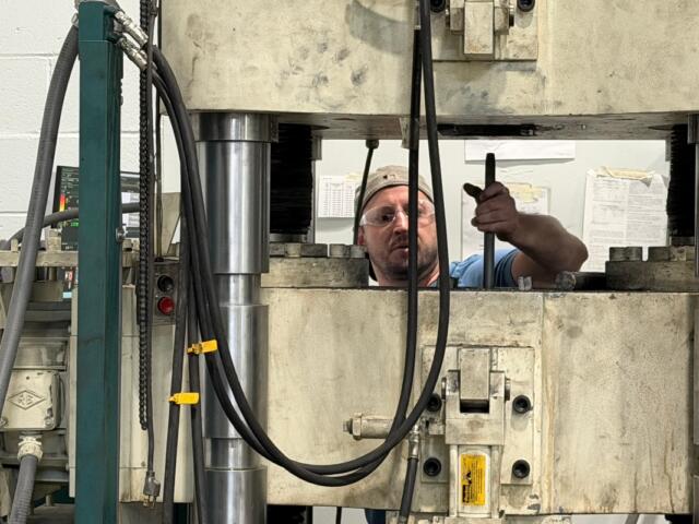 Metal used in road and bridge construction is tested at IDOT's Materials Testing and Research Center.