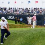 Chris Gotterup chips to the green on the 11th hole during the first round of the U.S. Open golf tournament at Shinnecock Hills Golf Club in Southampton, N.Y., Thursday, June 18, 2026.(AP Photo/George Walker IV)