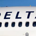 FILE - In this June 26, 2019, file photo, the company logo graces the side of a Delta Air Lines jetliner at Denver International Airport in Denver. (AP Photo/David Zalubowski, File)