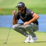 Max Homa lines up a putt on the 18th hole during the final round of the John Deere Classic golf tournament, Sunday, July 5, 2026, in Silvis, Ill. (AP Photo/Matt Marton)