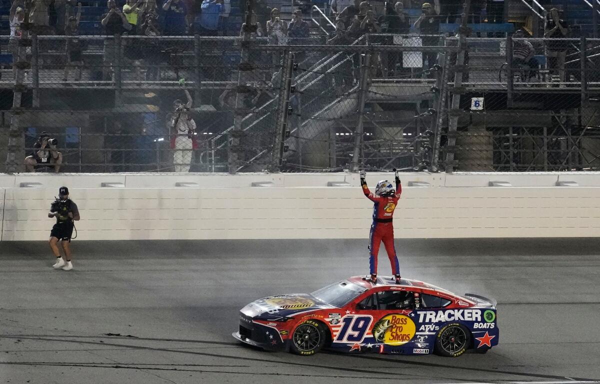Chase Briscoe (19) celebrates after winning a NASCAR Cup Series Eero 400 auto race at Chicagoland Speedway in Joliet, Ill., Sunday, July 5, 2026. (AP Photo/Nam Y. Huh)