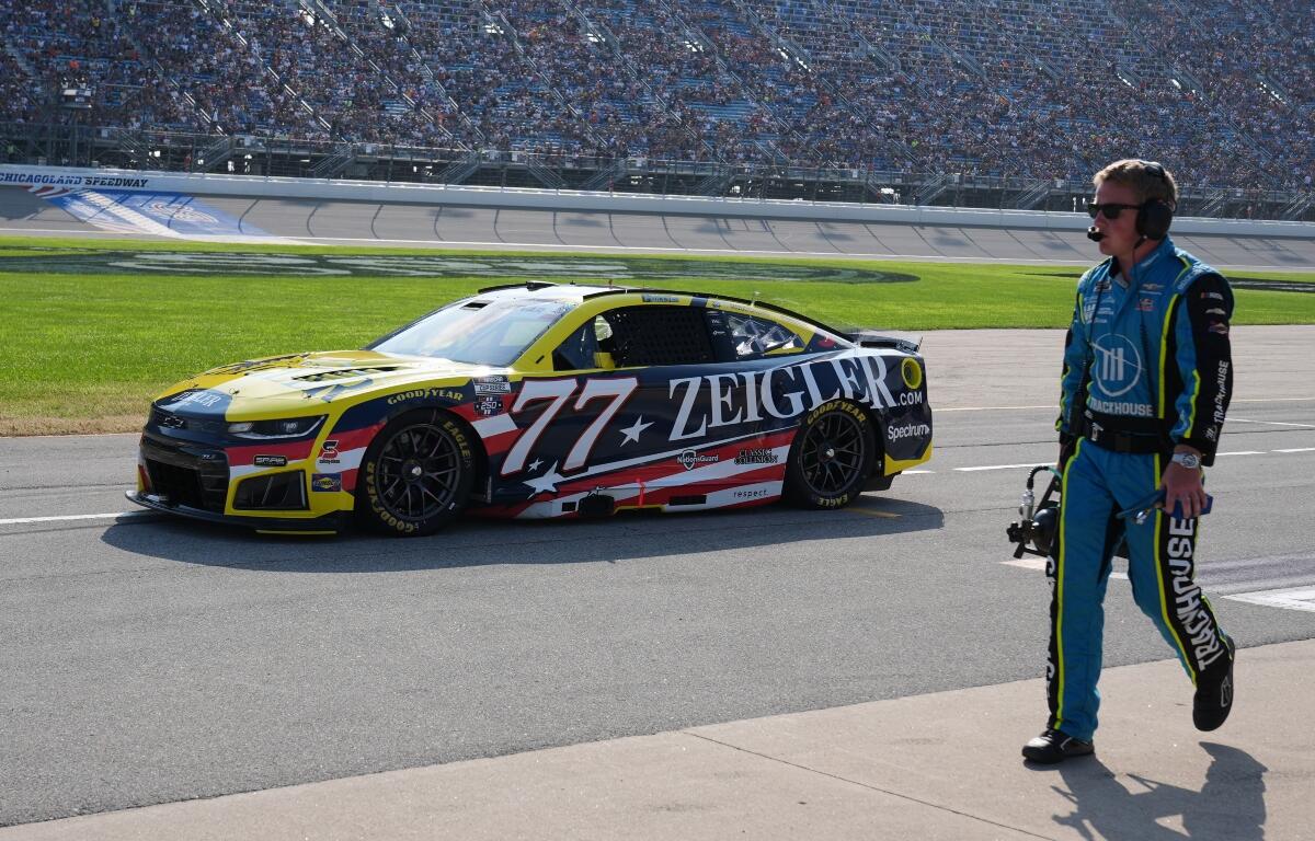Carson Hocevar (77) drives to the track during a NASCAR Cup Series auto race at Chicagoland Speedway in Joliet, Ill., Sunday, July 5, 2026. (AP Photo/Nam Y. Huh)