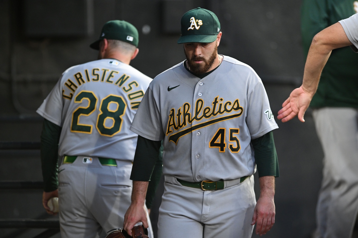 The Athletics relief pitcher Aaron Civale (45) reacts in the dugout after being pulled during the fifth inning of a baseball game against the Chicago White Sox in Chicago, Friday, July 10, 2026. (AP Photo/Paul Beaty)