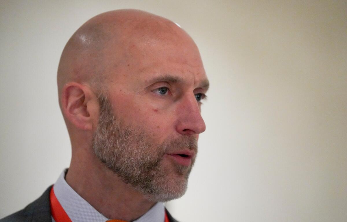 FILE - Illinois athletic director Josh Whitman speaks to the media during the NCAA Convention on Jan. 15, 2025, in Nashville, Tenn. (AP Photo/George Walker IV, File)