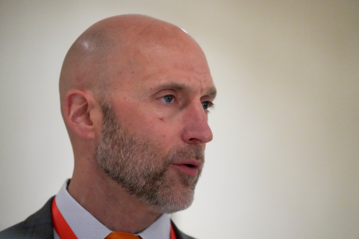 FILE - Illinois athletic director Josh Whitman speaks to the media during the NCAA Convention on Jan. 15, 2025, in Nashville, Tenn. (AP Photo/George Walker IV, File)