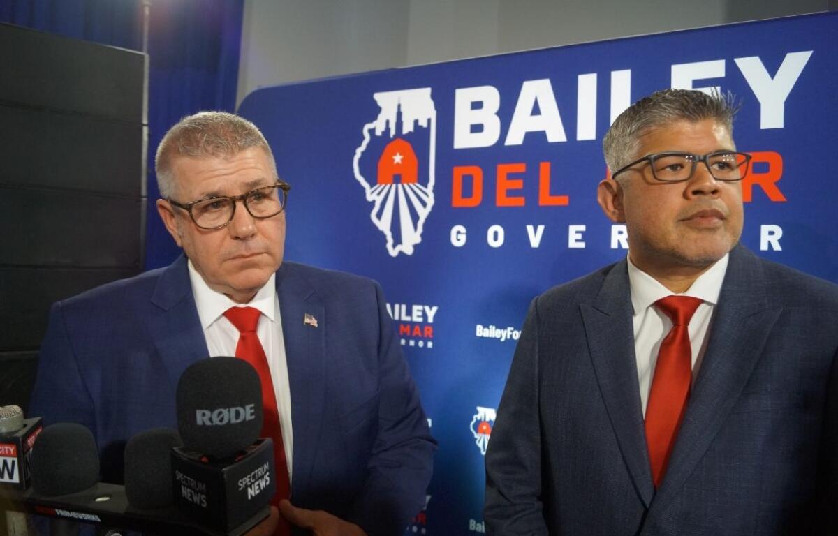Republican Darren Bailey, left, and his running mate, Aaron Del Mar, take questions from reporters after winning the Republican nomination on primary night on March 17, 2026. (Capitol News Illinois photo by Peter Hancock)