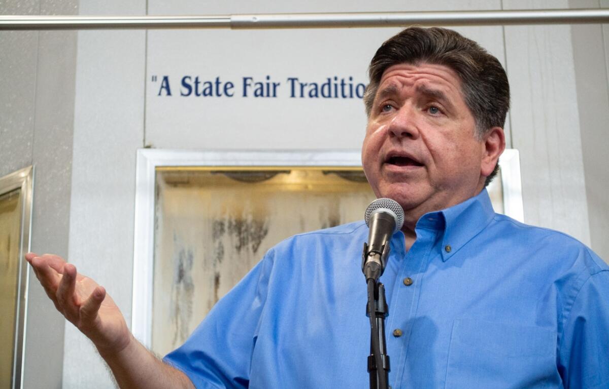 Gov. JB Pritzker takes questions at the Illinois State Fairgrounds in Springfield on Aug. 12, 2026. (Capitol News Illinois photo by Jerry Nowicki)