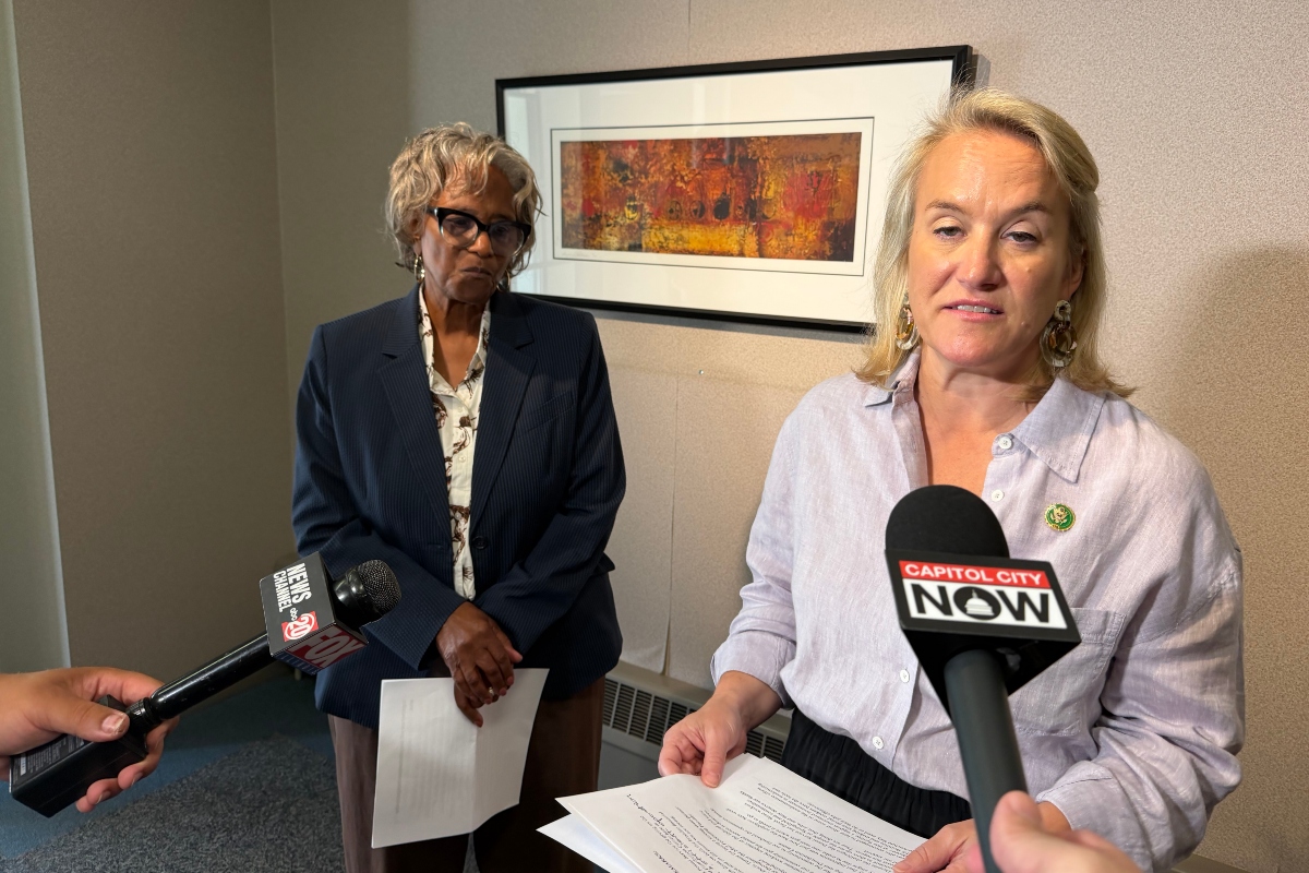 State Sen. Doris Turner (D-Springfield, left) and U.S. Rep. Nikki Budzinski, speak to reporters Thursday, Aug. 20, in downtown Springfield.