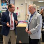Sen. Dick Durbin (D-IL), right, speaks with Kirby Winn, spokesperson for ImpactLife blood centers.
