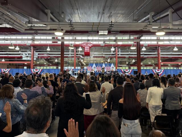 300 people, and their families, take part in a naturalization ceremony Wednesday, August 19, at the Illinois State Fairgrounds.