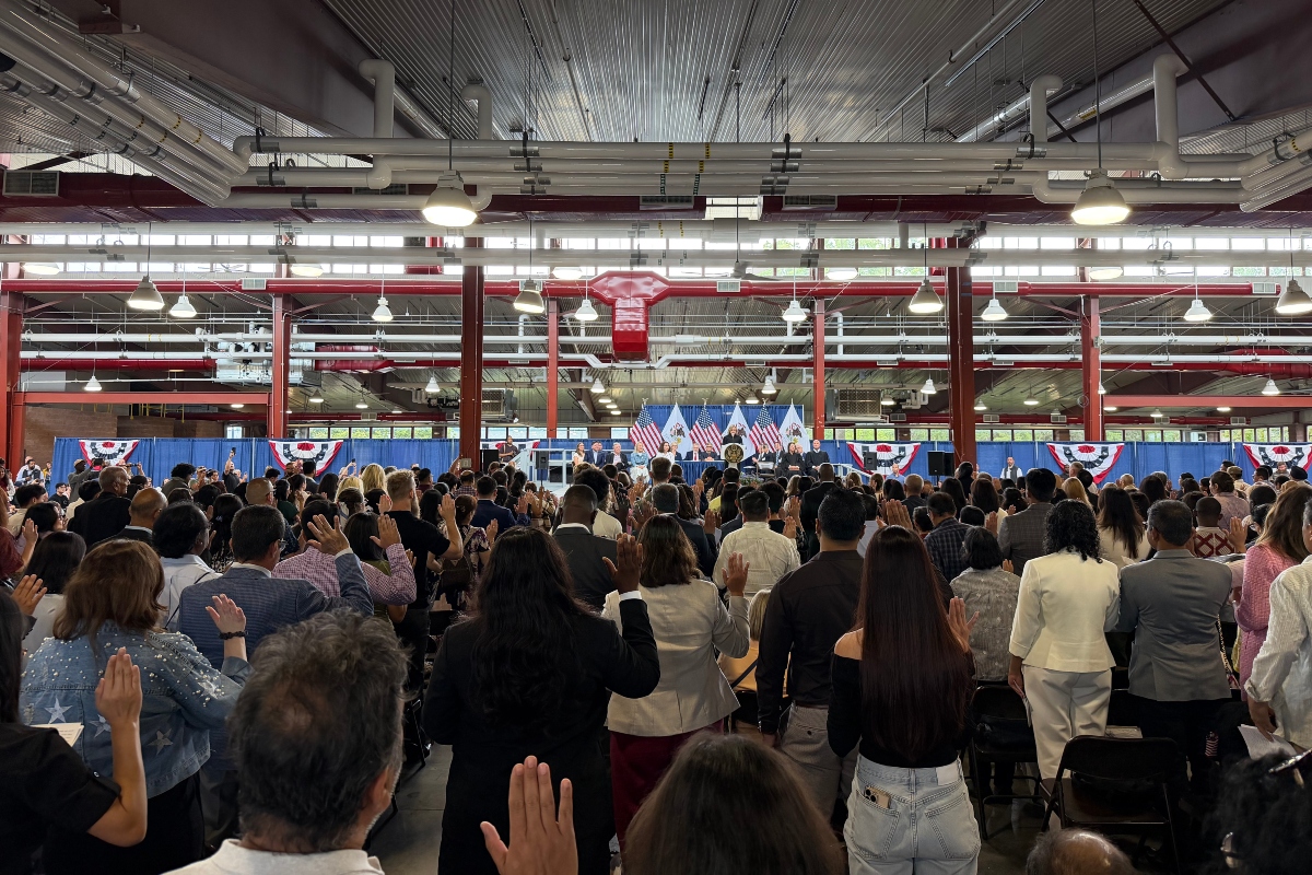 300 people, and their families, take part in a naturalization ceremony Wednesday, August 19, at the Illinois State Fairgrounds.