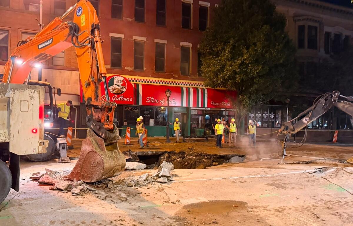 City Water, Light, and Power crews work to fix a water main break in downtown Springfield Thursday, August 27.