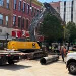A water main section was waited on the ground as crews worked on a break at 5th and Monroe Friday, Aug. 28.