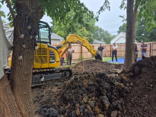 Crews dig up the back yard of an undisclosed home in Auburn in the investigation of Brenda Bottoms, reported missing in 1987.